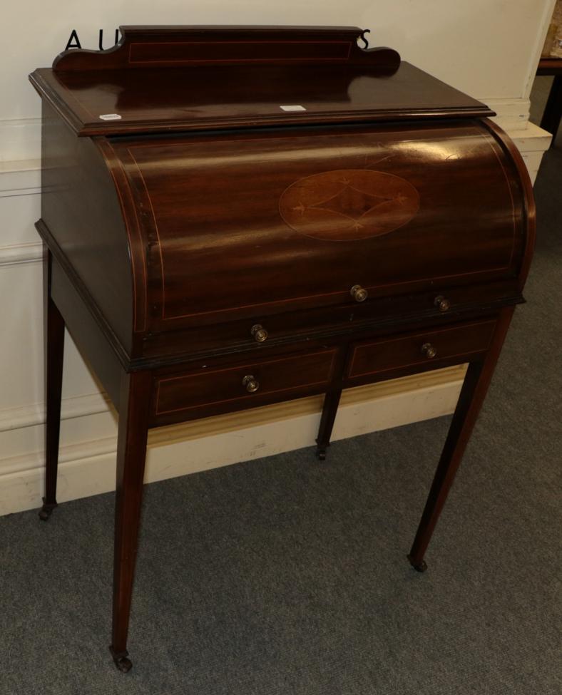 Lot 1510 - A late Victorian roll top desk