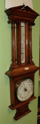 Lot 1511 - An oak cased aneroid barometer, retailed by John Mason, 36 High Street, Rotherham