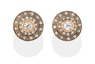 Lot 2004 - A Pair of Diamond Cluster Earrings, a central old cut diamond with two rows of old cut diamonds...