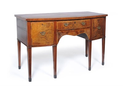 Lot 1536 - A George III Mahogany, Ebony and Boxwood Strung Bowfront Sideboard, circa 1800, the crossbanded top