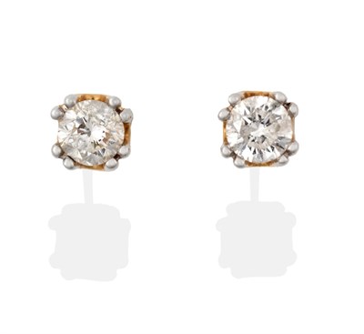 Lot 2049 - A Pair of 18 Carat Gold Diamond Solitaire Earrings, the round brilliant cut diamonds in white...