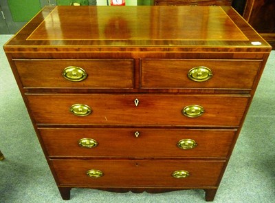 Lot 1539 - A George III Mahogany and Boxwood Strung Straight Front Chest, circa 1800, the crossbanded top...