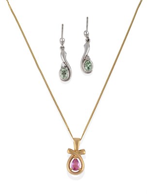 Lot 2067 - A 9 Carat Gold Pink Sapphire Pendant on 9 Carat Gold Chain, a pear cut pink sapphire in a...