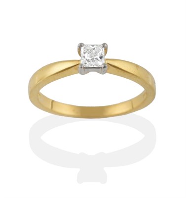 Lot 2083 - An 18 Carat Gold Diamond Solitaire Ring, the princess cut diamond in a white four claw setting on a