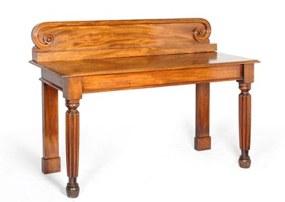 Lot 1541 - A Mahogany Serving Table, 2nd quarter 19th century, the staged back with C scroll corners above...