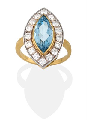Lot 2085 - An Aquamarine and Diamond Cluster Ring, the marquise cut aquamarine in a yellow collet setting...