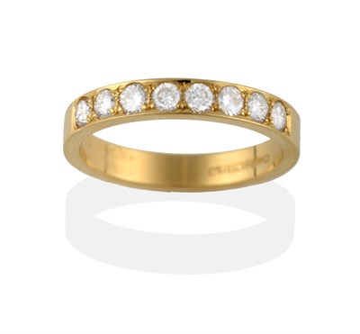 Lot 2101 - An 18 Carat Gold Diamond Half Hoop Ring, eight round brilliant cut diamonds in yellow claws...