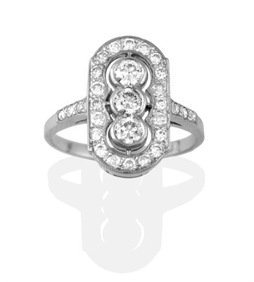 Lot 2109 - An Art Deco Style Diamond Cluster Ring, a trio of round brilliant cut diamonds in white collet...