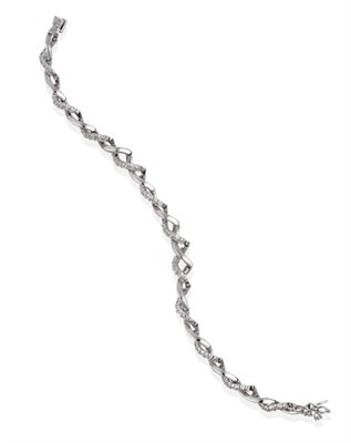 Lot 2112 - An 18 Carat White Gold Diamond Bracelet, of entwined links, round brilliant cut diamonds in...