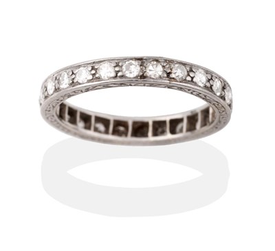 Lot 2120 - A Diamond Eternity Ring, the round brilliant cut diamonds in white channel and millegrain settings