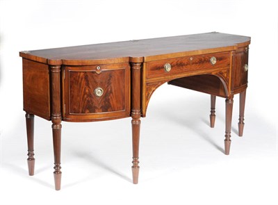 Lot 1545 - A George IV Mahogany Breakfront Sideboard, 2nd quarter 19th century, the top formerly fitted with a