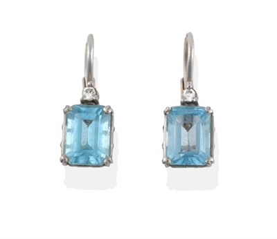 Lot 2126 - A Pair of 18 Carat White Gold Diamond and Aquamarine Earrings, a round brilliant cut diamond...