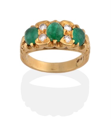 Lot 2143 - An Emerald and Diamond Ring, three graduated cabochon emeralds spaced by two round brilliant...