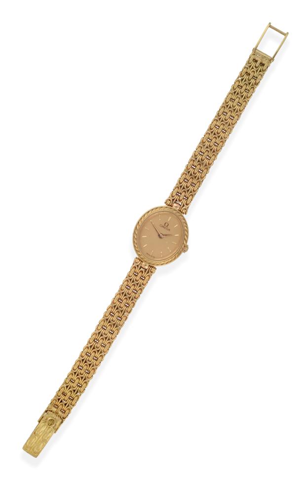 Lot 2171 - A Lady's 18ct Gold Wristwatch, signed Omega, circa 1985, quartz movement, champagne coloured...