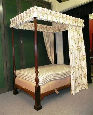 Lot 1551 - A Mahogany and Oak Four Poster Bed, 19th century and later, the plain canopy fitted with brass...