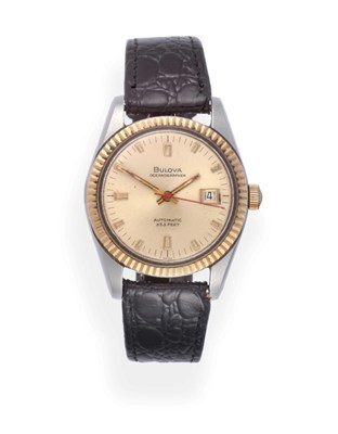 Lot 2213 - A Steel and Gold Automatic Calendar Centre Seconds Wristwatch, signed Bulova, model: Oceanographer
