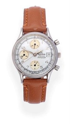 Lot 2215 - A Stainless Steel Automatic Calendar Chronograph Wristwatch, signed Mondia, circa 1980,...