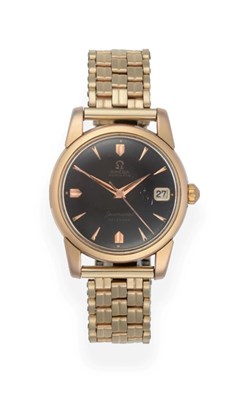 Lot 2222 - A Gold Plated Calendar Centre Seconds Wristwatch, signed Omega, model: Seamaster Calendar,...
