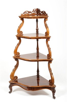 Lot 1557 - A Victorian Rosewood Four Tier Whatnot, 3rd quarter 19th century, the top tier with fret cut...