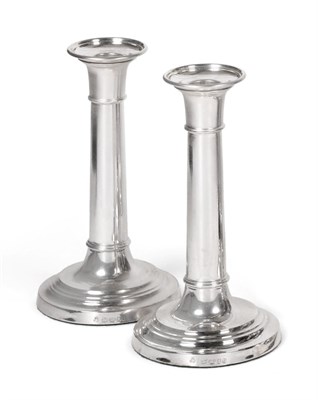 Lot 2250 - A Pair of Elizabeth II Silver Candlesticks, makers mark MCH, London, 2008, on spreading part-fluted