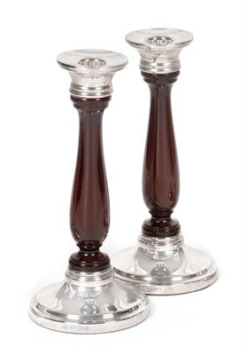 Lot 2251 - A pair of Elizabeth II Silver-Mounted Turned-Wood Candlesticks, The Silver Mounts by Barker...