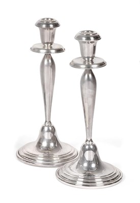 Lot 2252 - A Pair of Silver Candlesticks, with English import marks for Birmingham, 1998, on stepped...