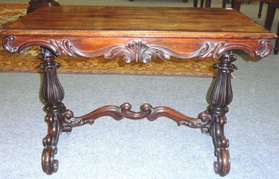 Lot 1560 - A William IV Rosewood Centre Table, 2nd quarter 19th century, the moulded top above a scrolling...