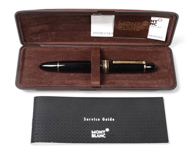 Lot 2291 - A Mont Blanc Meisterstück No. 149 Fountain Pen, the bi-colour nib engraved with foliage and...