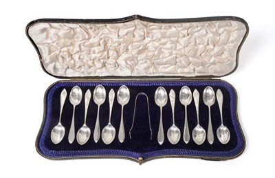 Lot 2327 - A Cased Set of Twelve George V Silver Teaspoons and an Associated Pair of Sugar-Tongs, the...