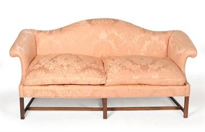 Lot 1571 - A George III Mahogany Framed Settee, early 19th century, upholstered in pink silk damask with...