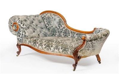 Lot 1574 - A Victorian Walnut Framed Chaise Longue, 3rd quarter 19th century, upholstered in grey and...