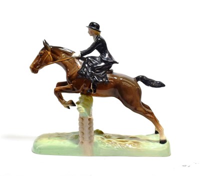 Lot 141 - Beswick Huntswoman (Style One - Rider and Horse Jumping), model No. 982, brown gloss