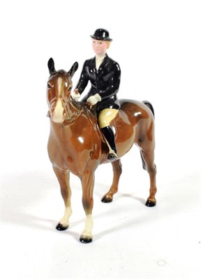 Lot 143 - Beswick Huntswoman (Style Two: Standing), model No. 1730, brown gloss