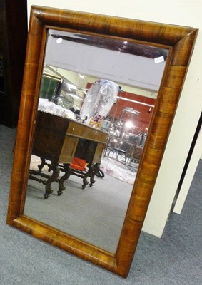 Lot 1584 - An 18th Century Walnut Cushion Framed Mirror, the later rectangular plate contained within a...