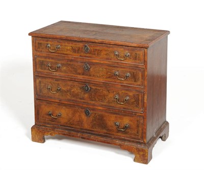 Lot 1589 - A George II Walnut and Ebony Strung Four Drawer Chest, mid 18th century, the crossbanded top...