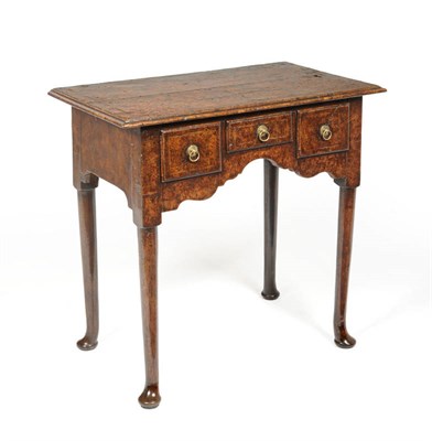 Lot 1591 - A Burr Oak and Boxwood Strung Kneehole Dressing Table, the quarter-veneered top above three...