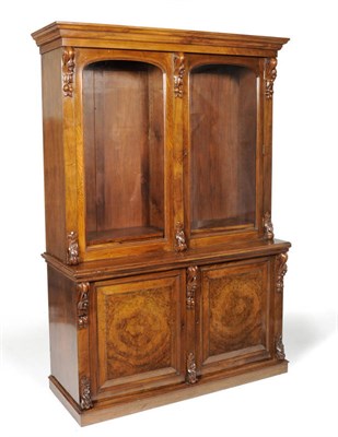 Lot 1592 - A Victorian Figured Walnut Bookcase, 3rd quarter 19th century, with ovolo moulded cornice and...