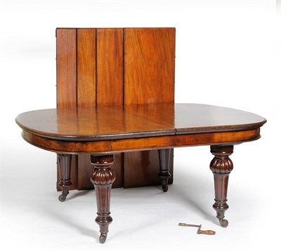 Lot 1593 - A Victorian Mahogany Extending Dining Table, circa 1860, the rounded rectangular top above a...