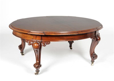 Lot 1596 - A Victorian Mahogany Oval Extending Dining Table, the moulded breakfront edge above a plain frieze