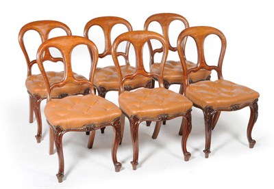 Lot 1597 - A Set of Six Victorian Mahogany Balloon Back Dining Chairs, late 19th century, upholstered in...