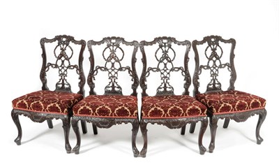 Lot 1602 - A Set of Four 19th Century Chippendale Style Dining Chairs, the scrolling leaf carved top rail...