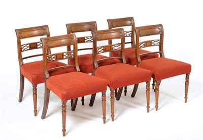 Lot 1605 - A Set of Six Late George III Mahogany Dining Chairs, early 19th century, the curved top rail...