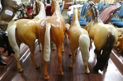 Lot 162 - Beswick palomino gloss horses and foals including: Large Hunter, model No. 1734, Bois Roussel...