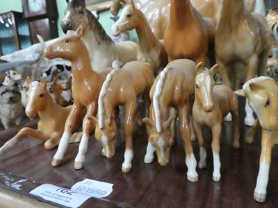 Lot 162 - Beswick palomino gloss horses and foals including: Large Hunter, model No. 1734, Bois Roussel...