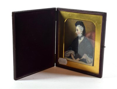 Lot 176 - Victorian school: a miniature portrait of a lady, half length seated, wearing a black scarf and...