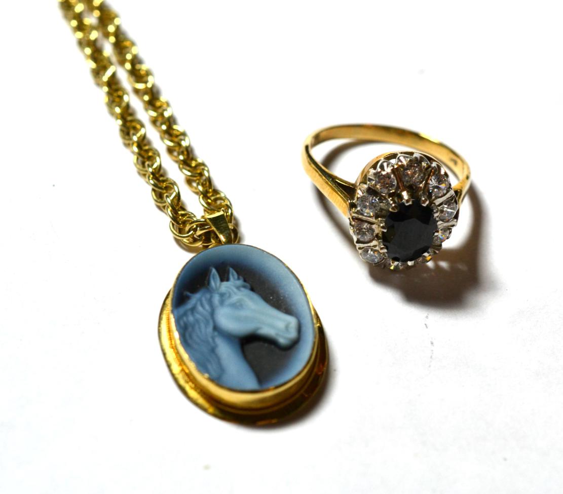 Lot 181 - A cameo pendant stamped '750' on a fancy link chain clasp stamped '375', chain length 61cm;...