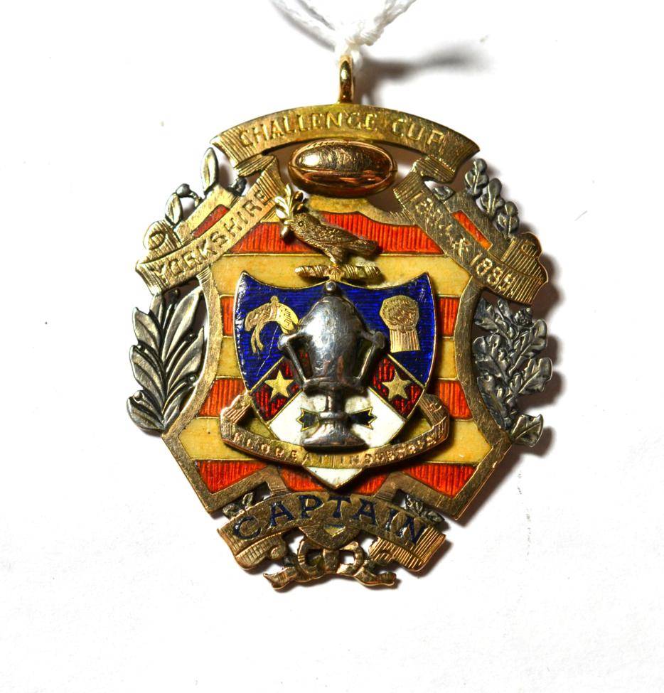 Lot 184 - A Yorkshire Challenge Cup 1884 & 1885 presentation medal, stamped '15CT', back inscribed 'Won...