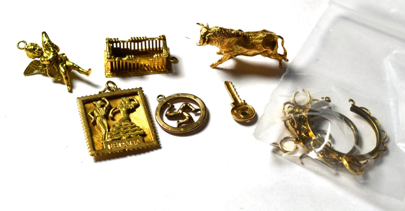 Lot 202 - Six unmarked charms/pendants including a bull, a key etc; together with two 9 carat gold...