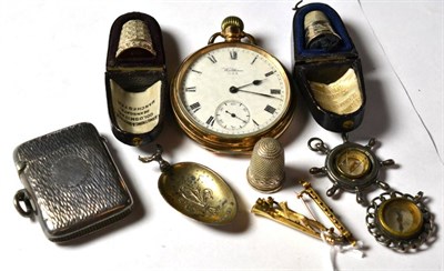 Lot 231 - Three silver thimbles; a silver vesta case; a Waltham pocket watch; a running fox and hunting...