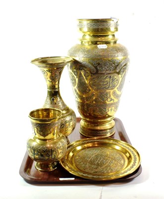 Lot 245 - Four pieces of Damascus brass, copper and silvered metal including vases and a plate (20th century)